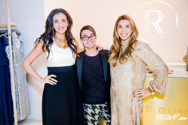 Rent the Runway founders Jenn Hyman and Jenny Fleiss flank fashion designer Christian Siriano.